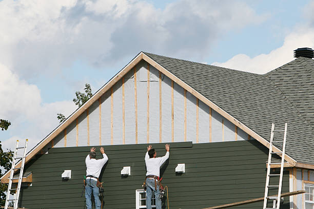 Professional Storm Damage Siding Repair technician working in Lewisberry, PA